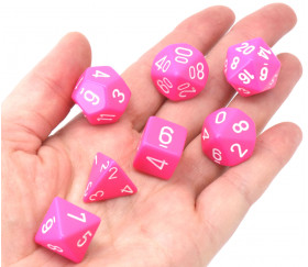 Set 7 dés multi-faces rose opaque pour jeux de rôle.