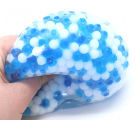 Balle sensorielle souple perles blanches et bleues Ø 10 cm