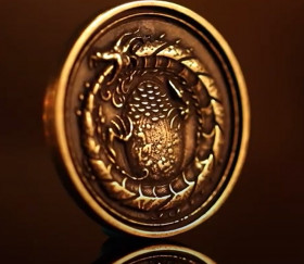 Pièces de jeux en métal gravé avec dragon